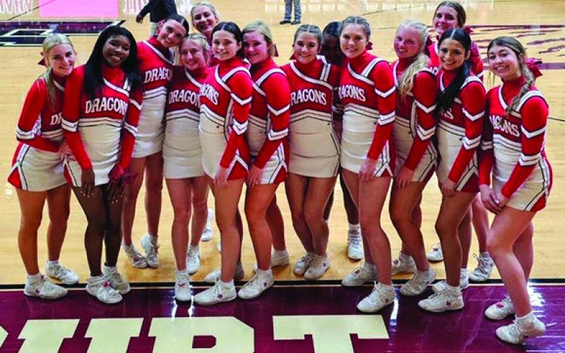 Dragon Cheerleaders gathered together for this amazing photo opportunity marking the victory over Timpson.