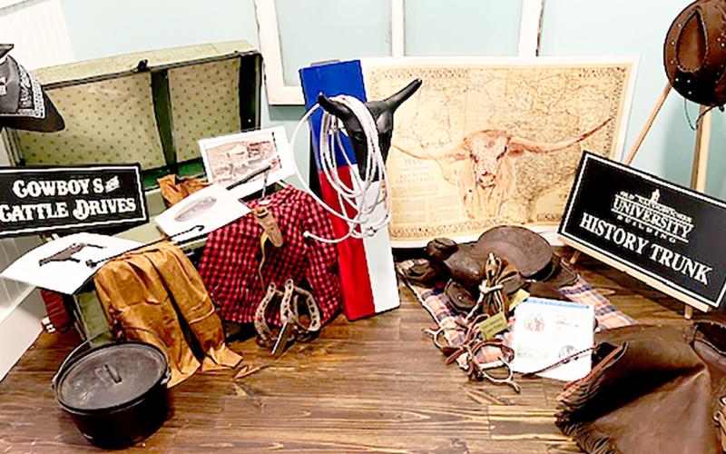 Several Shelby County residents contributed items to the Nacogdoches Old University Building’s new History Trunk project. The inaugural theme is “Cowboys and Cattle Drives.” Submitted | Light and Champion