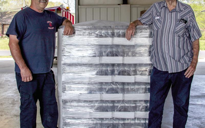 Samford Lodge delivers water to fire department