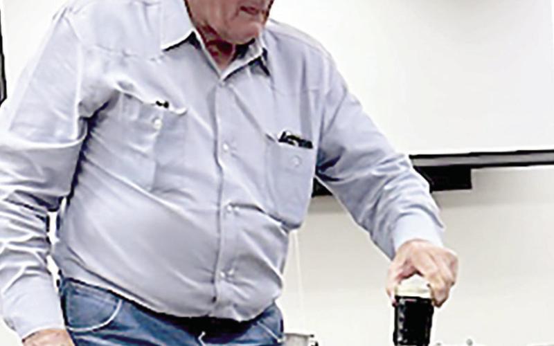 Ronnie Wolfe recounts stories of canning food in cans, not jars, when he was growing up, recommends using pressure cookers to tenderize the food before preserving.