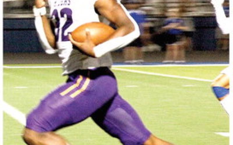 u Kaden Dixon easily outdistances Springhill defense as he heads for a third quarter touchdown. (Leon Aldridge photo/The Light and Champion)
