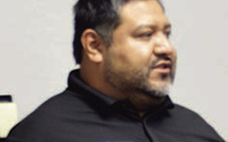 Carlos Lopez of iDocket reviews the system's proposed upgrade and the ben - efits it will provide to county and district courts. Zack Clark | Light and Champion