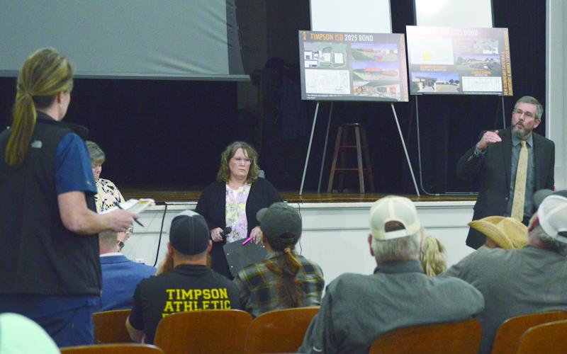 Timpson ISD Superintendent Mid Johnson (right) responds to a question from an audience member at a public meeting held on Monday night. The district has proposed a $9 million bond issue for the construction of new facilities. See next week’s Light and Champion for a full report from the meeting. Zack Clark | Light and Champion