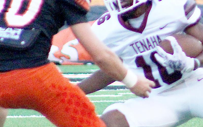 KyRon Giles of Tenaha makes a cut to elude a West Sabine defender in a game where the Tigers came up on the short end of the score, 48-7. Zakary Hartley | Tiger Media