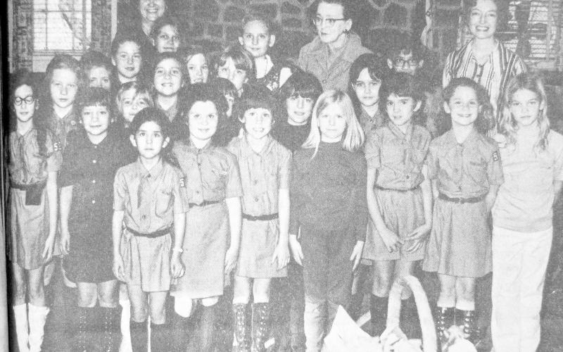 Center Brownie Troop No. 587 at a January meeting nearly ten years ago. They are front row from left: Amy Walker, Rhonda Walker, Morgan Ballard, Nannette Gragg, Robin ?, Toni Jackson, Leslie Hightower, Donna Collum, ?, and Gina Spring. 2nd row, Cheri Lawson, ?, Sheilah Adams, Stacy Wilson, ?. 3rd row, Dana Kemmel, Yolanda Wilburn, Monette Wagnon, Donna Johnson. The adults are Mrs. Wilburn, the late Mrs. Iva Hurst and Mrs. John Walker.