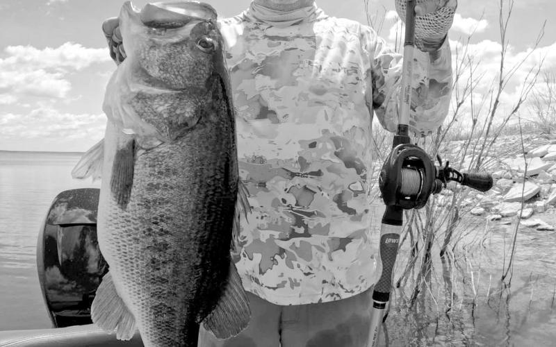 Leroy Boss with the 14.85 pounder he caught off a spawning bed recently while fishing at Lake O.H. Ivie with Hill Country Hammers Guides and Outfitters. (Photo courtesy of Jerad Pool)