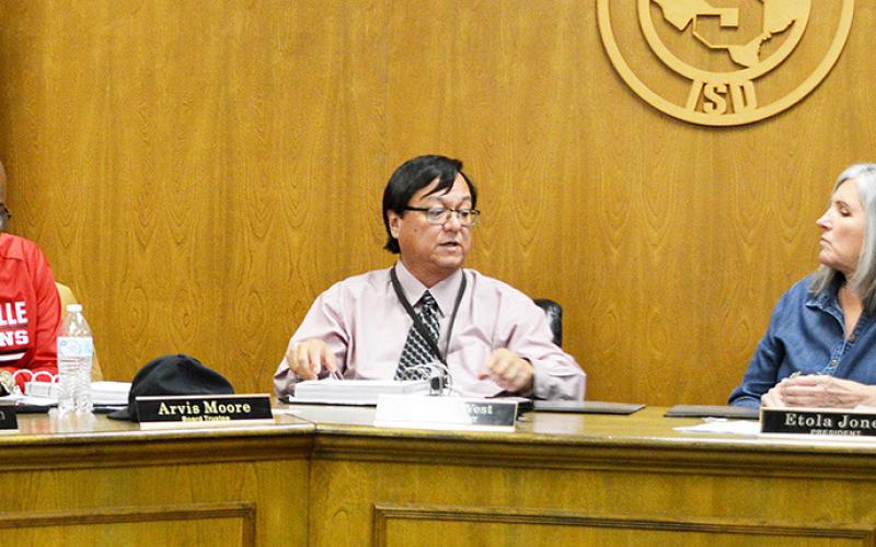 Superintendent Dr. Ray West updates the Shelbyville school board on the district’s improvement plan. David Danley | Light and Champion
