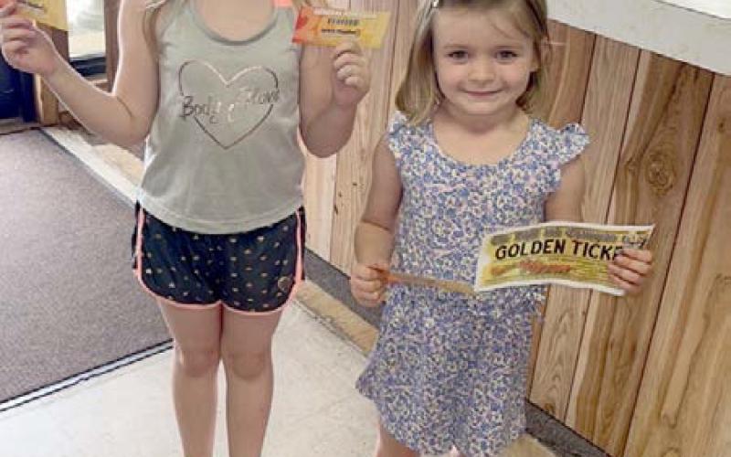 These two darling children with a winning Golden Ticket they found when their Mom opened her newspaper last Thursday. The two girls were headed to the Splash Kingdom last weekend to use their tickets, and one of the Ompa Lumpas even managed to find an extra pair of tickets so Mom and Dad could go with the two girls. Ashley Chandler | The Light and Champion