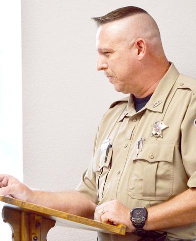 Chris Davis, Shelby County courthouse security officer discusses a security system for the Shelby County Juvenile Probation Department. Zack Clark | Light and Champion