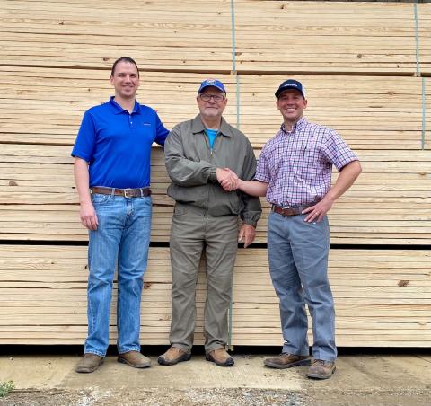 TBLA President Gary Moore thanks Joshua Garcie (left) and Kyle Martinez (right) of Interstate Building Materials for their generous donation of the materials required to build this year’s custom-built Greenhouse.
