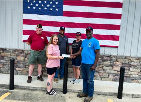 Pineywoods Beverage presents donation to VFW Post 8904