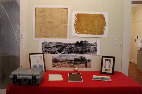 The new exhibit featuring Roy R. Loving's 1923 photo and Lawrence Davis's 2023 commemoration photo.