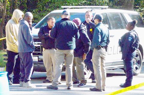 CPD officers can be seen speaking with individuals at the scene where the unattended death was discovered.