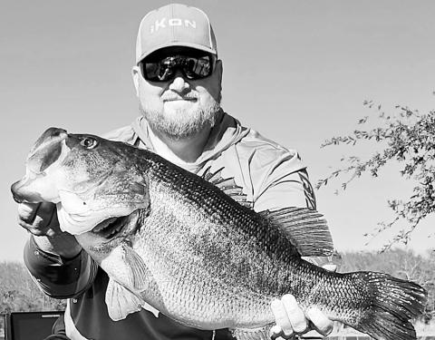 Fishing guide Austin Miles with the 16.04-pound Legacy Lunker he reeled in at Purtis Creek State Park Lake. Miles’ bass is the No. 27 heaviest Texas bass of all-time. Photo courtesy of Austin Miles