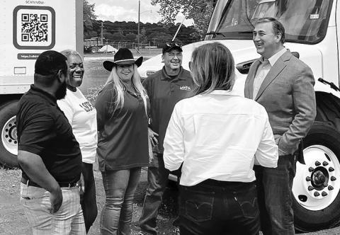 U.S. Rep. Nathaniel Moran visits with students at Pineland Commercial Driving Academy. Moran recently assisted the facility in obtaining $1.1 million in federal funding that will help provide training for training up to 50 students a year and assist them with job placement after graduation. Submitted | Light and Champion