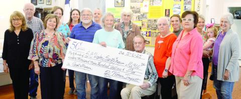 50 Women makes donation to museum