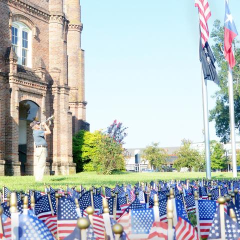 Lee Jarvis blows Taps during VFW Post 8904’s Patriot Day ceremony held Sept. 11 honoring the memory of those who lost their lives during the 9/11 terrorist attack and in wars and conflicts throughout America’s history. David Danley | Light and Champion