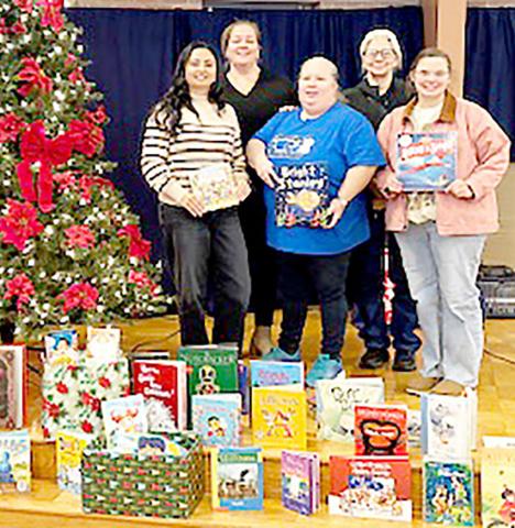 Members of the Center Women’s Reading Club donated books to the Operation Blue Santa and Cookies &amp; Cocoa groups. Representing the groups at the meeting were (left to right) Amanda Radney, Joanna Lopez, Amy Lindley, Charlene Jackson and Baylea Cockrell Submitted | Light and Champion
