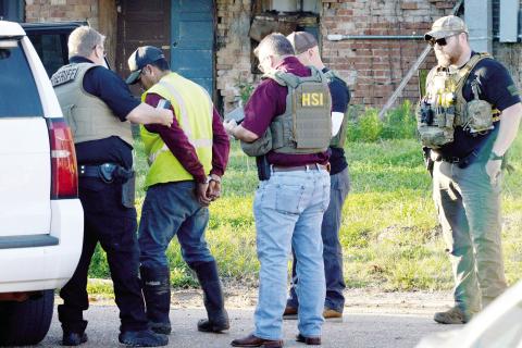ICE agents were conducting operations throughout Shelby County last week assisted by local and area law enforcement agencies. This detention occurred in Timpson. David Danley | Light and Champion