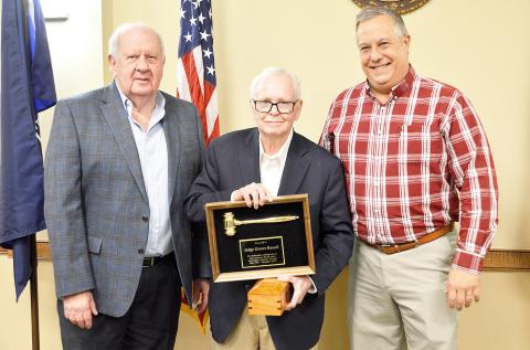 Russell honored for service to city with retirement reception