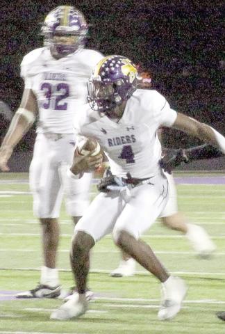 Emonte “Cash” Cross looks for a way out of the pocket. Cross ended his career as the leader in career passing yards and passing touchdowns. Leon Aldridge | The Light and Champion