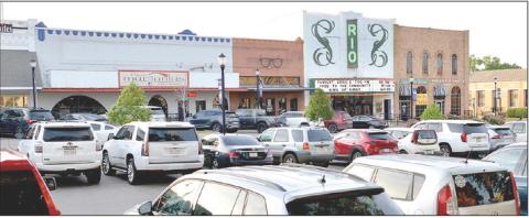 Cars fill the parking spaces around the Rio Theatre in Center last Thursday night as numerous county residents took advantage of the opportunity to view the King of Kings animated movie sponsored by First Baptist Church of Center. David Danley | Light and Champion