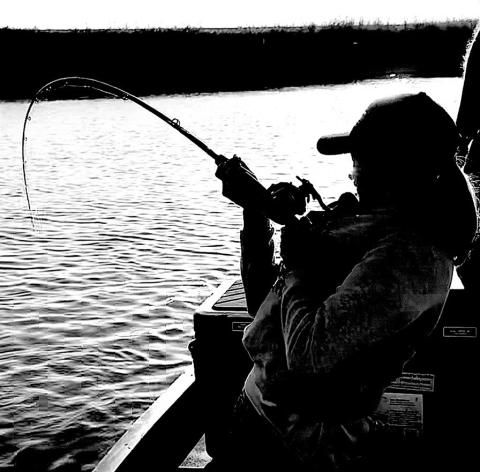11-year-old Kadence Oliver puts the heat on a big flathead catfish that gobbled up a live perch. William Oliver Photo