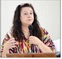 Sherry Harding of Shelby County Outreach Ministries addresses a group of area healthcare providers and assistance agencies along with community volunteers at a town hall meeting on Monday.