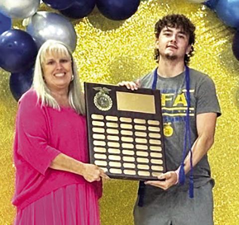 Gilbert Link Memorial Scholarship Recipient Lo - gan Smith presented by Shana Brittain