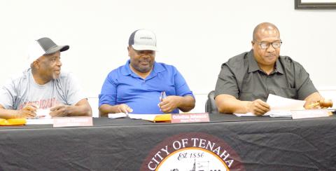 David Thomas (from left), Orinthia Johnson and Mayor O’Neal Jones discuss the 2025-26 proposed tax rate at the Tenaha City Council’s September meeting. David Danley | Light and Champion