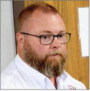 Eric Lawrence of the Shelby County Appraisal District discusses with the court the paying of a property tax refund to Tyson Foods. Zack Clark | Light and Champion