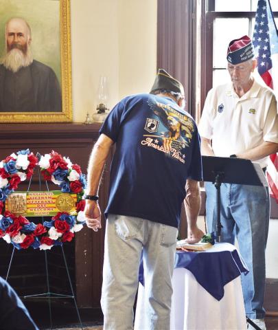 Members of the VFW Post 8904 pay honor to veterans of the Viet Nam War including many local service members who lost their lives in the conflict at a ceremony held in the historic Shelby County courthouse. Zack Clark | Light and Champion