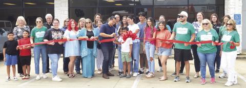 Bee Kahn, owner of Bee’s Nails, and his family were recently visited at his business by members of the Shelby County Chamber of Commerce and other community members to hold an official ribbon-cutting ceremony. Zack Clark | Light and Champion