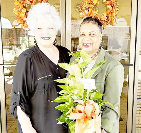 Community Beautification is one of Center Garden Club’s annual projects. Each month from September through May, club members will present local institutions, businesses, and other entities with a complimentary floral design or plant. In November, Vicky Warren presented her floral design to Vickie Barnes, manager of the Farmers State Bank Drive In. Submitted | Light and Champion