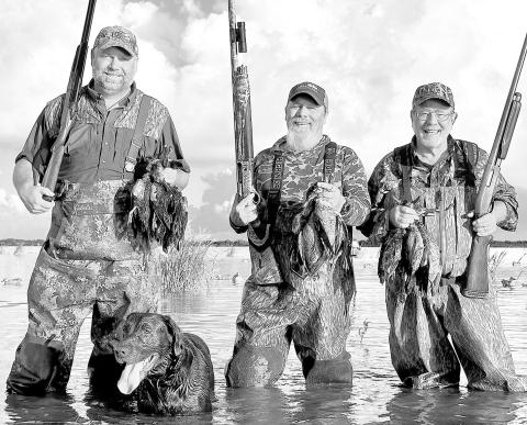 Shannon Tompkins (far right) his brother Les (center) and Matt Kaminski with some nice straps of teal taken in a public lands marsh along the Texas coast in 2024. Courtesy Photo