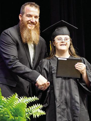Claycee Renick basks in the moment as she participates in the Timpson High School Class of 2025’s graduation ceremony. Submitted | Light and Champion