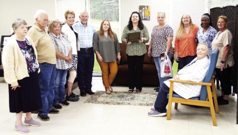 SCOM holds raffle drawing, dedicates library