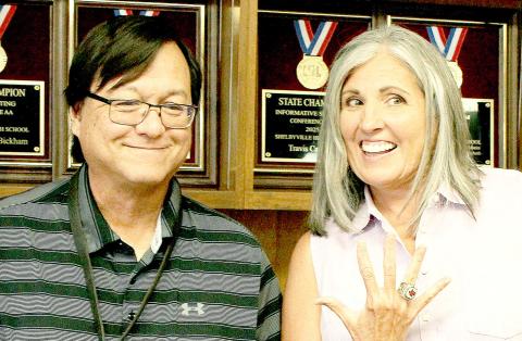 Etola Jones (right), Shelbyville ISD Board of Trustees president, along with Dr. Ray West, Superintendent, shows off the championship rings the district received for the high school’s 2025 triumph in state UIL competition. A ceremony was held last week in the board room to present the rings to all of the members and advisors of the UIL team. Submitted | Light and Champion