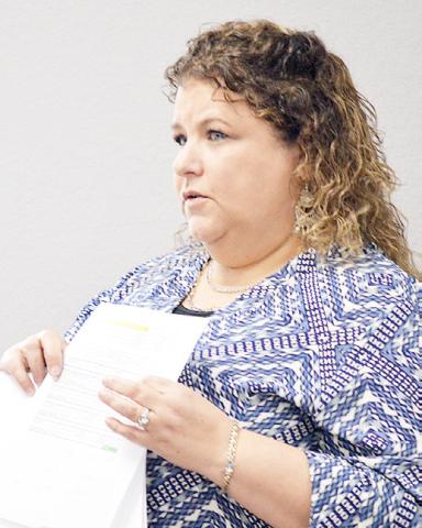 Tax Assessor-Collector Debora Riley discusses the proposed 2025 property tax rate with the Shelby County commissioners court at its Aug. 27 meeting. Zack Clark | Light and Champion