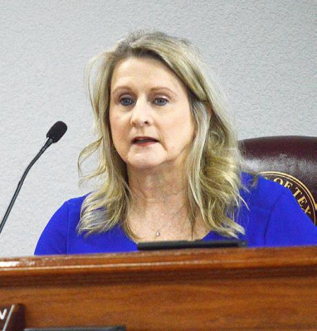 Shelby County Judge Allison Harbison informs the commissioners court of funds which the county is set to receive to upgrade its radio system. Zack Clark | Light and Champion