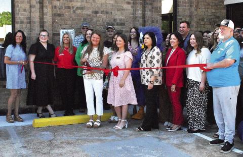 The Timpson branch of BOM banks celebrated its grand re-opening celebration April 10 after its recent re-modeling with a ribbon cutting sponsored by the Timpson Area Chamber of Commerce. Lisa White | Light and Champion