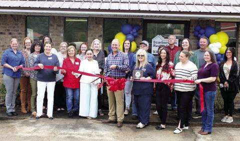 The Shelby County Chamber of Commerce Ambassadors joined Alan Scarborough and Scarborough Realty at its ribbon cutting held at its new location at 1110 Tenaha St. #3 last Thursday. Scarborough Realty has ofces in Center, Carthage, Longview and Jefferson. The rm has ve agents - Rhonda Proftt, Ana Palacios, Tiffany Koenig, Natalie Mayeld and Keyunda Williams - based in Center, who can serve clients throughout the surrounding areas. Lisa White | Light and Champion