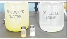 The Mariana lithium extraction plant will take produced water (left) it receives from Select Water and after processing will wind up with powdered lithium (small bottle, right). Impurities extracted from the water will be form barium cakes (small bottle, left) which will be disposed of. The leftover brine water (right) will then be injected underground. David Danley | Light and Champion