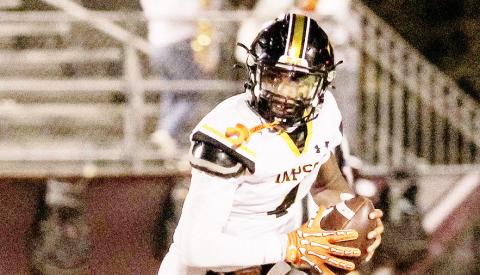 Timpson’s Albert Parker, Jr., rolls out looking for an open receiver in the Bears’ game against San Augustine Wolves last Friday night. Despite a valiant effort, the Bears fell to the Wolves by a score of 30-14. Savannah Cassell | Timpson ISD Student Media Intern