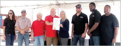 BRK Meats LLC team pictured (left to right) Jaime Tatum, Director of Communication; Cam Barton, BRK Meats Director of Procurement; Barbara and Bobby Vice, BRK Meats owners; Betty Russo, Gulf Coast/East Texas Regional Representative at Office of the Governor; Clay Tatum, BRK Meats Director of Operations; Marvin Brakefield, BRK Meats Director of Production; and Tenaha Mayor O’Neal Jones. (Shannon James photo/The Light and Champion)