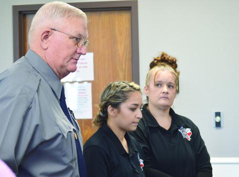 Sheriff Gerald Corbell, Compliance Officer Araceli Garcia (center), and Jail Administrator Tiffany Ryals (right) requested that the commissioners’ court hire a full time nurse for the Shelby County jail at its special meeting last week. Zack Clark | Light and Champion