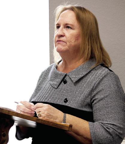 Cheryl Ray of Traylor & Associates seeks the participation of Shelby County in a tood mitigation study on the Sabine River. Lisa White | Light and Champion
