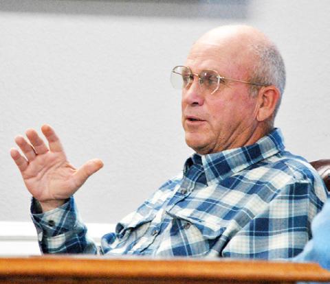 Comm. Pct. 3 Stevie Smith questions Sheriff Gerald Corbell on the condition of a sheriff’s office vehicle that was slated to be part of the county’s live auction to be held at 10:00 a.m. Friday at the Pct. 1 barn. Zack Clark | Light and Champion