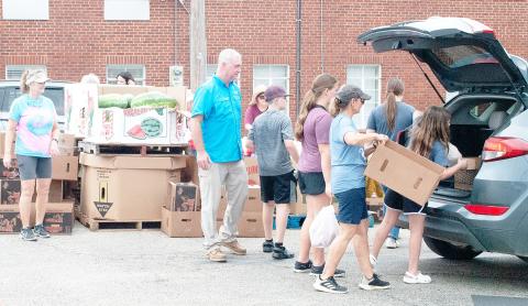 Helpful church volunteers were seen distributing food at the Center First Baptist Church parking lot on Friday, Aug. 22, during their monthly produce drop with the East Texas Food Bank. The church and its volunteers help distribute the Food Bank produce every fourth Friday of the month from 4 to 5:30 p.m. If you are interested, be sure to mark your calendars and stop by the First Baptist Church in Center next month on Friday, Sept. 26. Zack Clark | Light and Champion