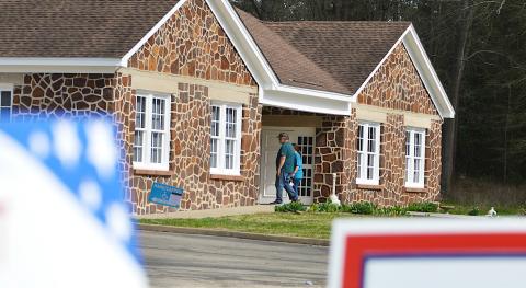 Voters enter the Center Community House to cast their ballots in Tuesday’s primary election. With all but one local position having only Republican candidates, the winners in that party’s primary captured their races. The Comm. Pct. 4 race will not be decided until November’s general election. David Danley | Light and Champion